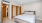 Bedroom with modern flooring and large closets