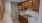 a kitchen with wooden cabinets at a new apartment in Dayton Ohio