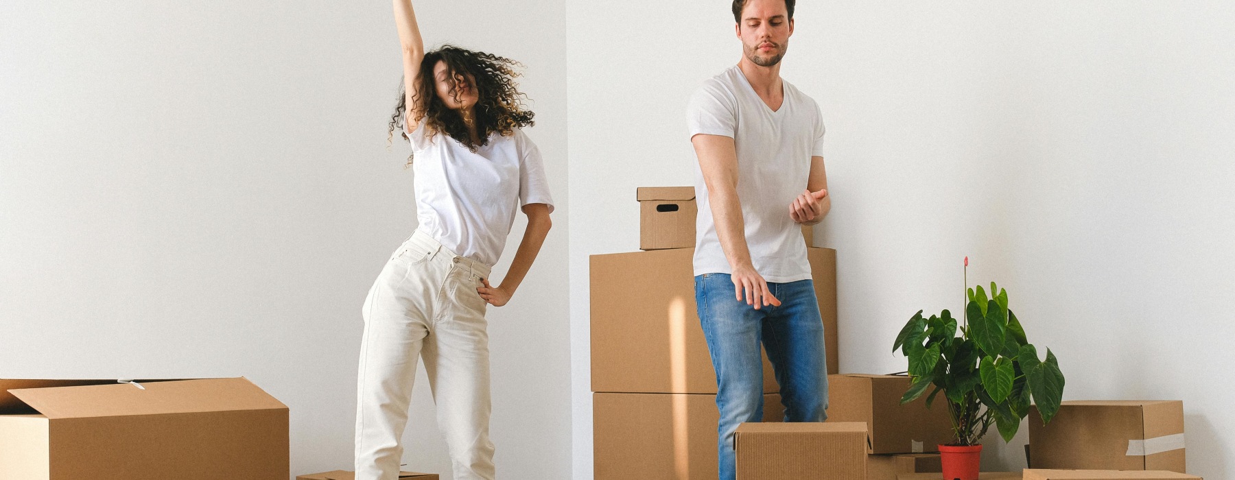 A couple with moving boxes