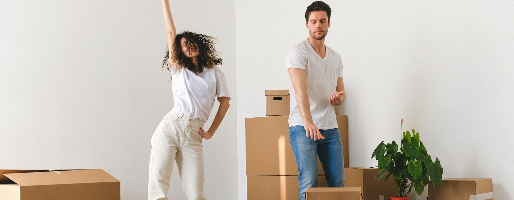 A couple with moving boxes